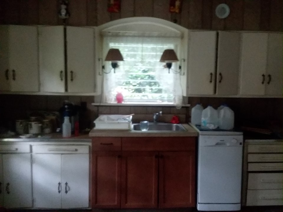 the ultimate before this was the kitchen. taken down to the studs this kitchen has been rebuilt to emphasize the natural lighting flooding the space.